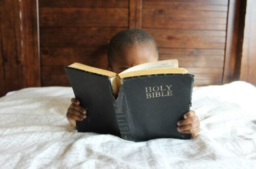 boy reading bible